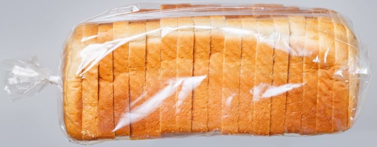 Bread in plastic bag.