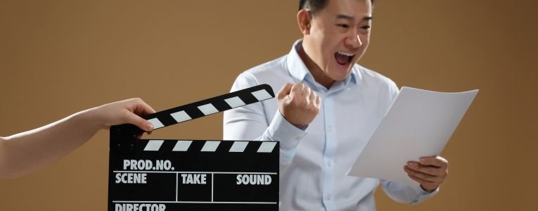 Emotional Asian Actor Performing Role While Second Assistant Cam