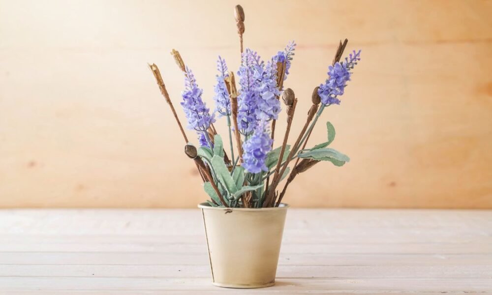 A bouquet of statice and caspia flowers, featuring soft purple statice blooms and delicate, wispy caspia in a textured arrangement.