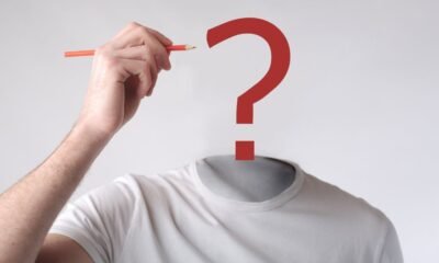 a image of a person with a question mark head with pencil on it.