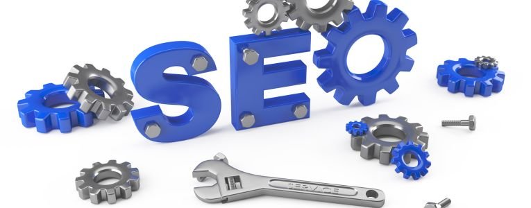 SEO lettering surrounded by tools and gears for AI Web Rankers