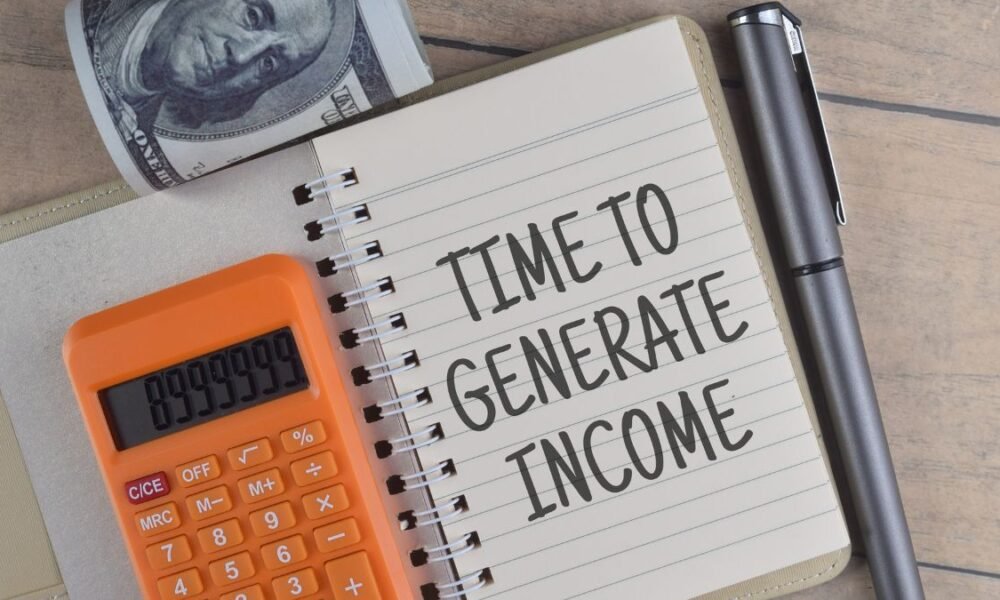 Time To Generate Income wording with a calculator. Financial, finance, business concept