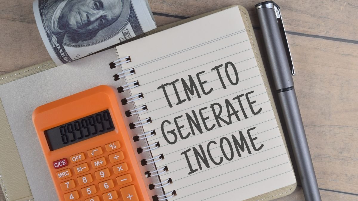 Time To Generate Income wording with a calculator. Financial, finance, business concept