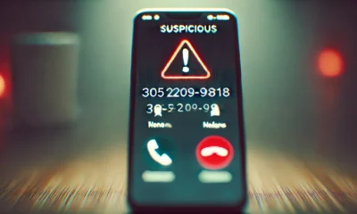 Smartphone showing an incoming call from 305-209-9818 with warning signs, highlighting potential risks.